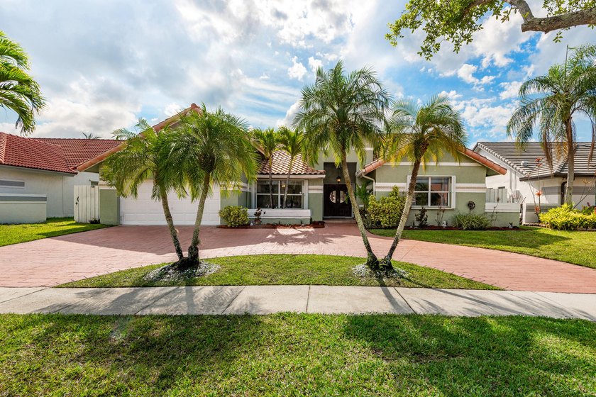 Pride of ownership shines throughout this beautifully maintained - Beach Home for sale in Pembroke Pines, Florida on Beachhouse.com