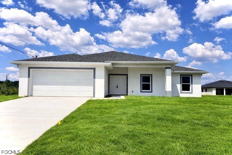 Brand New Home located in Northwest Lehigh on a CORNER LOT on a - Beach Home for sale in Lehigh Acres, Florida on Beachhouse.com
