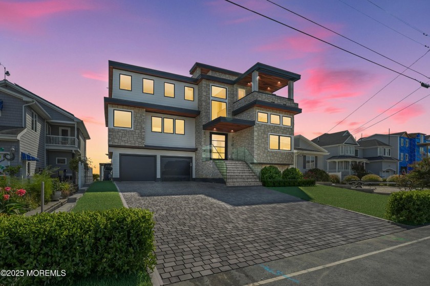 Discover the pinnacle of coastal living in this stunning - Beach Home for sale in Manahawkin, New Jersey on Beachhouse.com