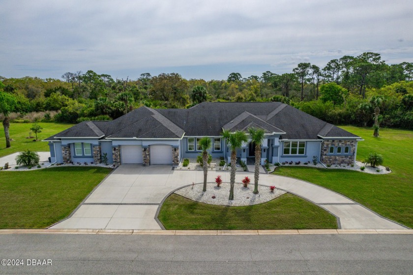 Enjoy luxury living in this custom estate home in the highly - Beach Home for sale in Ormond Beach, Florida on Beachhouse.com