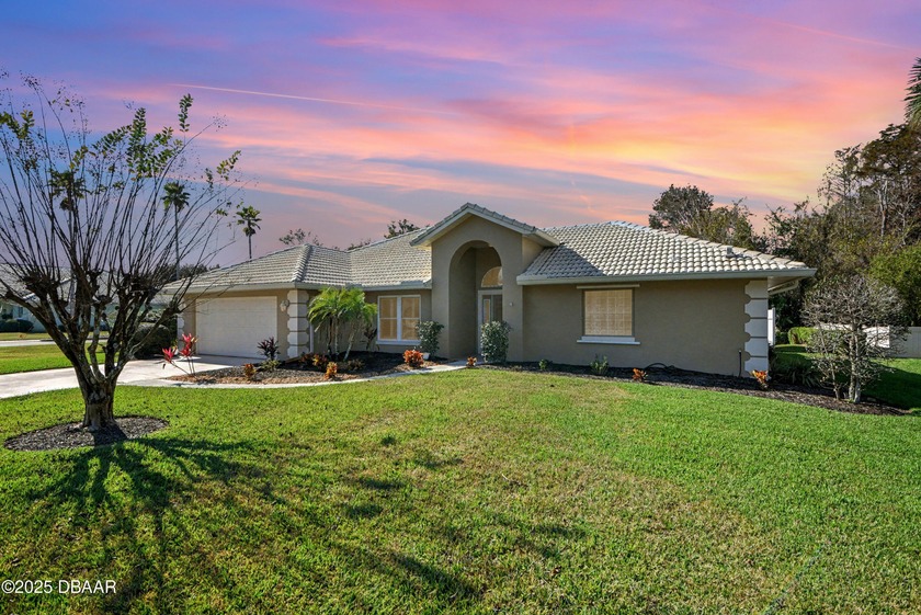 Nestled on a desirable corner lot overlooking a tranquil pond in - Beach Home for sale in Port Orange, Florida on Beachhouse.com