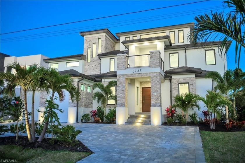 STUNNING NEW CONSTRUCTION ULTRA LUXURY WATERFRONT HOME. This - Beach Home for sale in Cape Coral, Florida on Beachhouse.com