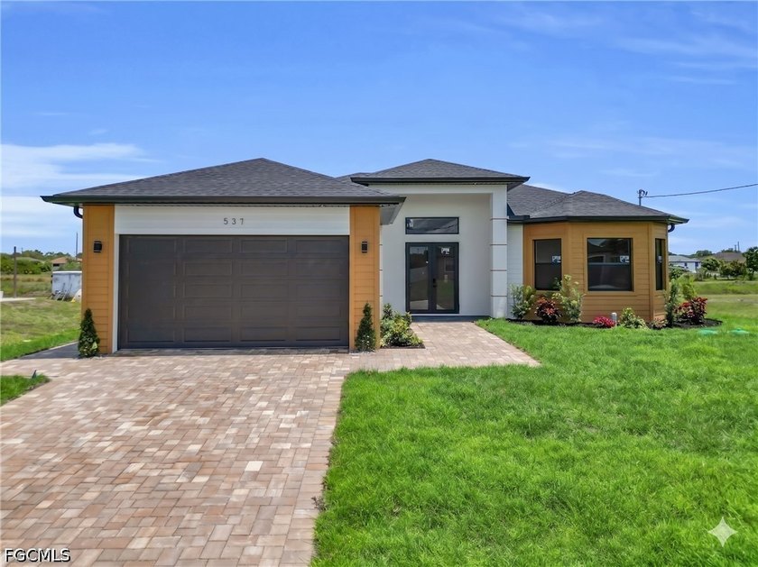 This stunning new construction 4-bedroom, 2-bathroom home is - Beach Home for sale in Lehigh Acres, Florida on Beachhouse.com