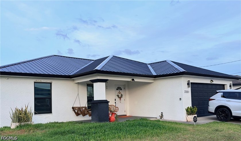 Remodeled and move-in ready, this beautiful Cape Coral home - Beach Home for sale in Cape Coral, Florida on Beachhouse.com