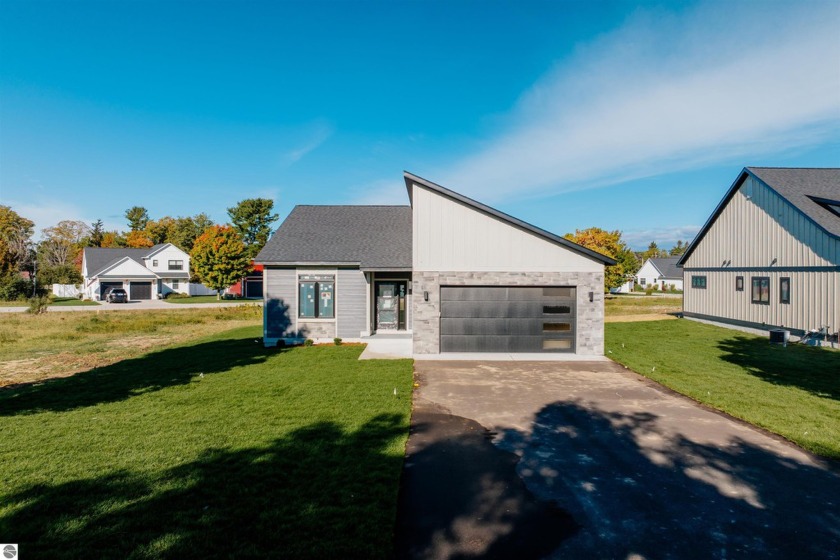 Get ready to be captivated by this modern home in the Village at - Beach Home for sale in Empire, Michigan on Beachhouse.com