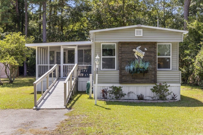 UPDATES GALORE! This fully furnished mobile home on leased land - Beach Home for sale in Murrells Inlet, South Carolina on Beachhouse.com