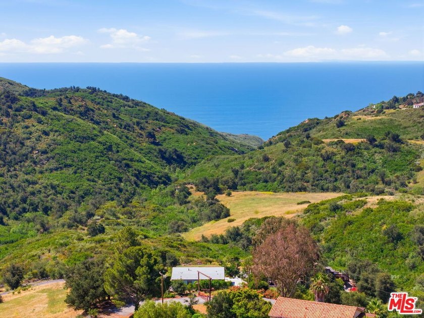 Nestled on approximately one acre of beautifully landscaped - Beach Home for sale in Malibu, California on Beachhouse.com