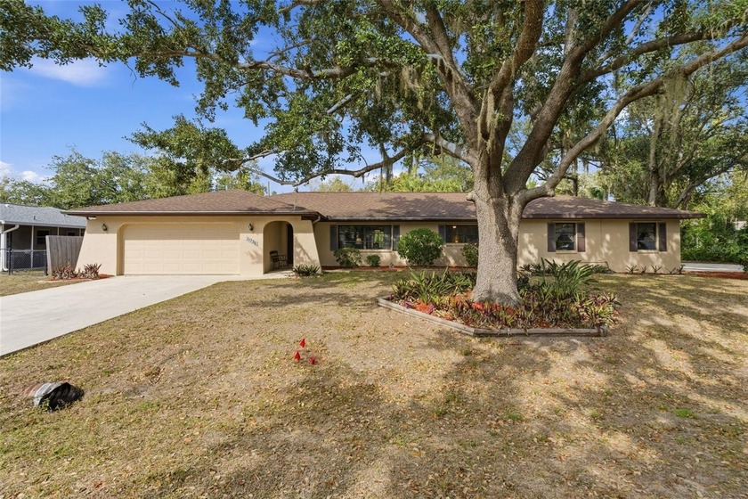 Welcome to this spacious 4-bedroom, 2-bathroom, Pool home with a - Beach Home for sale in Port Charlotte, Florida on Beachhouse.com