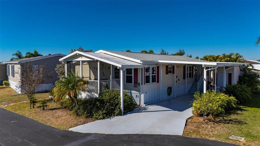 This beautifully updated 3-bedroom, 2-bath manufactured home is - Beach Home for sale in Port Charlotte, Florida on Beachhouse.com