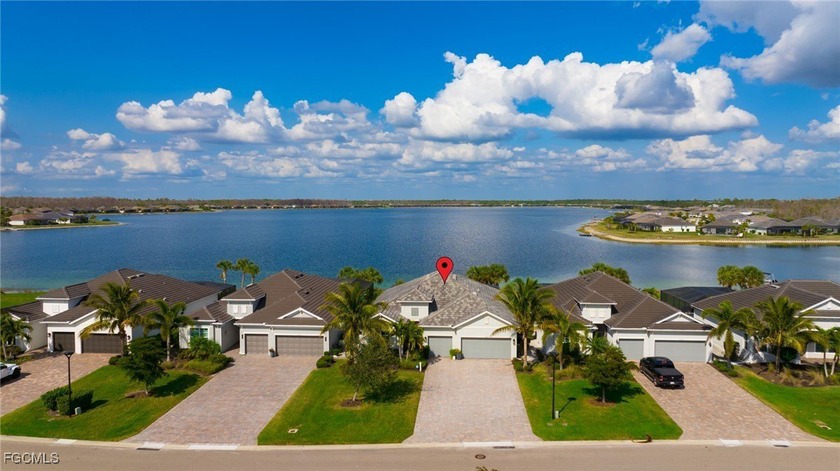 BREATHTAKING MILE-LONG LAKE VIEW! Discover 13424 Blue Bay Circle - Beach Home for sale in Fort Myers, Florida on Beachhouse.com