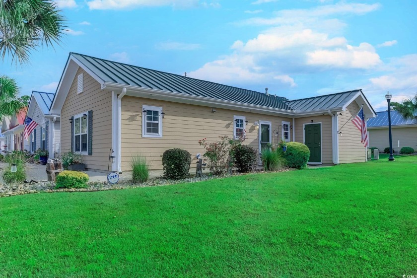 This highly desirable corner-lot home, built in 2019, is located - Beach Home for sale in Little River, South Carolina on Beachhouse.com