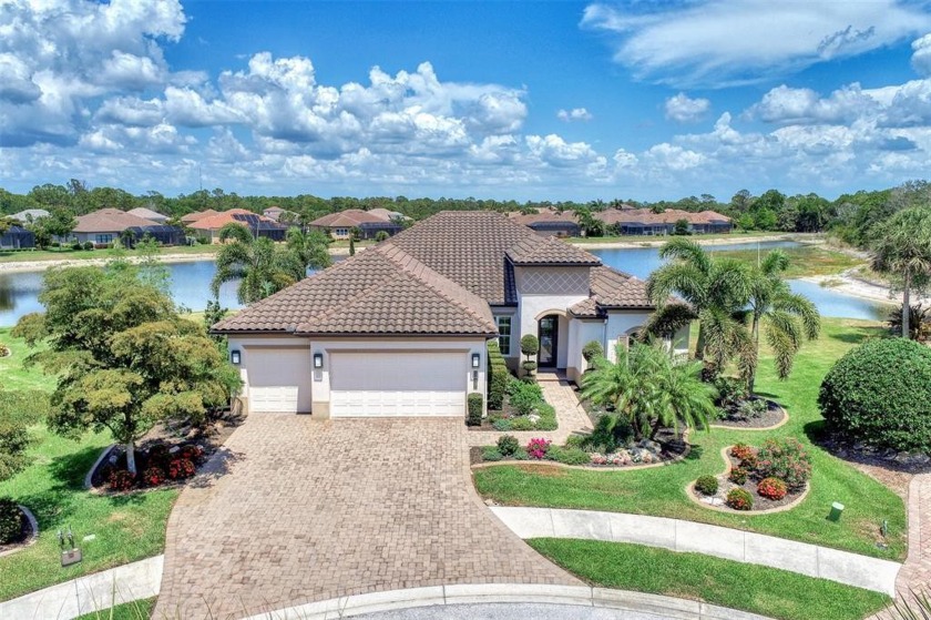 EXQUISITE SEMI-CUSTOM SAM RODGERS HOME IN GRAN PARADISO.  THIS - Beach Home for sale in Venice, Florida on Beachhouse.com
