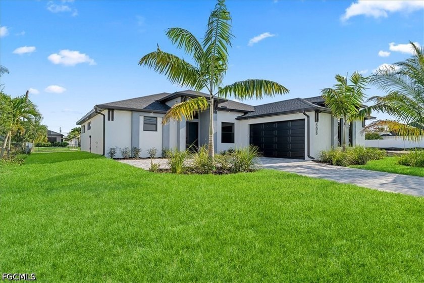 Welcome to your dream home in beautiful Cape Coral! This - Beach Home for sale in Cape Coral, Florida on Beachhouse.com