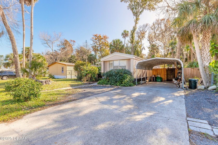 Welcome to this charming 2-bedroom, 2-bathroom home with an - Beach Home for sale in South Daytona, Florida on Beachhouse.com