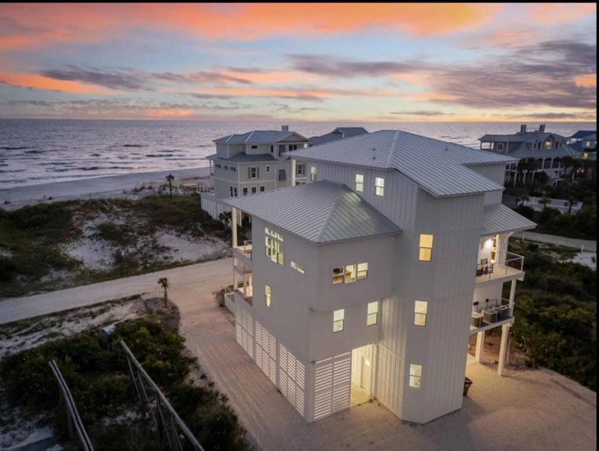 A SHOWSTOPPER of a home! Located in Secluded Dunes subd. This - Beach Home for sale in Cape San Blas, Florida on Beachhouse.com