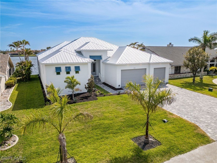 Welcome to 428 SW 53rd Ter, an extraordinary custom-built home - Beach Home for sale in Cape Coral, Florida on Beachhouse.com