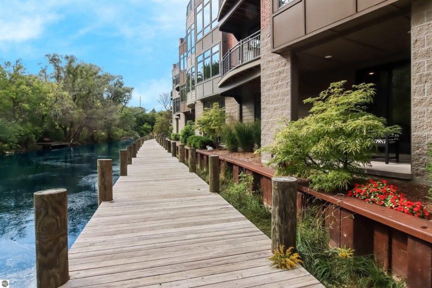Experience luxury urban living on the river in downtown Traverse - Beach Condo for sale in Traverse City, Michigan on Beachhouse.com