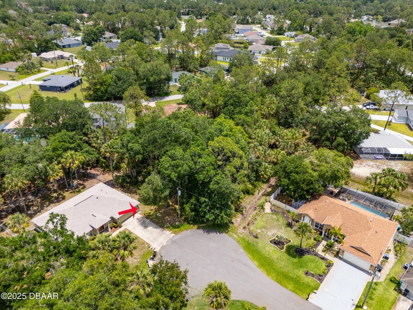 Tucked away at the end of a quiet cul-de-sac, this oversized - Beach Lot for sale in Palm Coast, Florida on Beachhouse.com