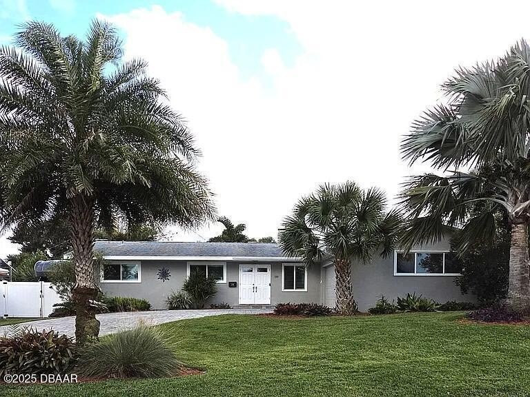 Charming 3 br 2 ba home elevated on 1/3 acre a short stroll from - Beach Home for sale in Ormond Beach, Florida on Beachhouse.com