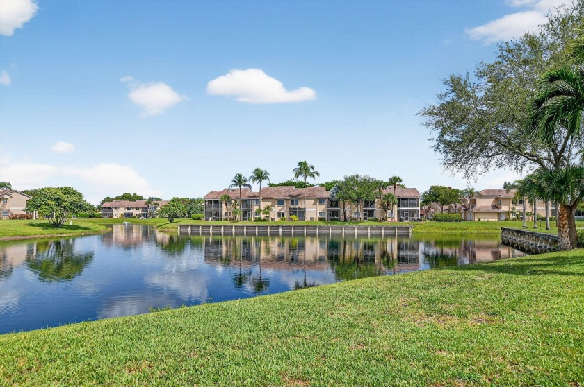 Savor peaceful lake views from your spacious, screened balcony - Beach Townhome/Townhouse for sale in Boca Raton, Florida on Beachhouse.com