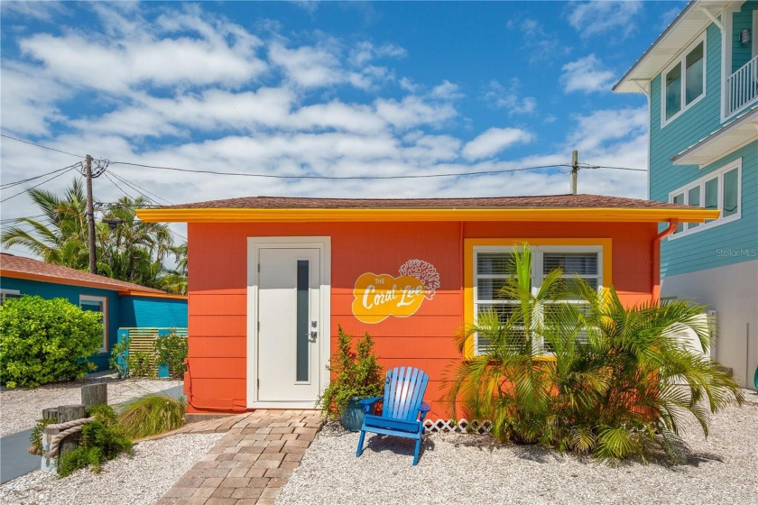 This one-bedroom, one-bathroom cottage named the Coral Lee - Beach Commercial for sale in Treasure Island, Florida on Beachhouse.com