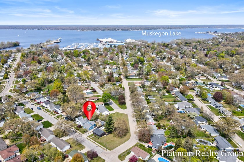 The cozy front of this home is deceiving! Packed with space - Beach Home for sale in Muskegon, Michigan on Beachhouse.com