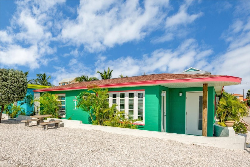 This brightly colored duplex named Cabana 1 & 2 offers two - Beach Commercial for sale in Treasure Island, Florida on Beachhouse.com
