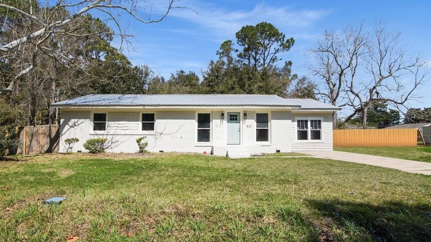 This beautifully remodeled 3-bedroom, 2-bathroom home with a - Beach Home for sale in Apalachicola, Florida on Beachhouse.com