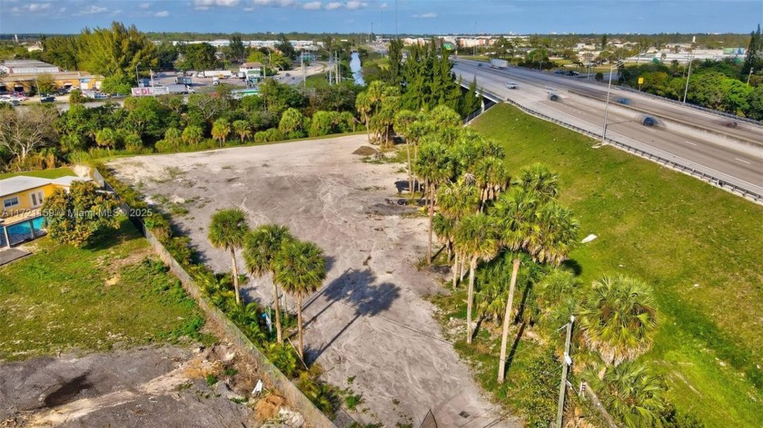 This is a partially fenced in 1 acre lot where someone may build - Beach Lot for sale in West Palm Beach, Florida on Beachhouse.com