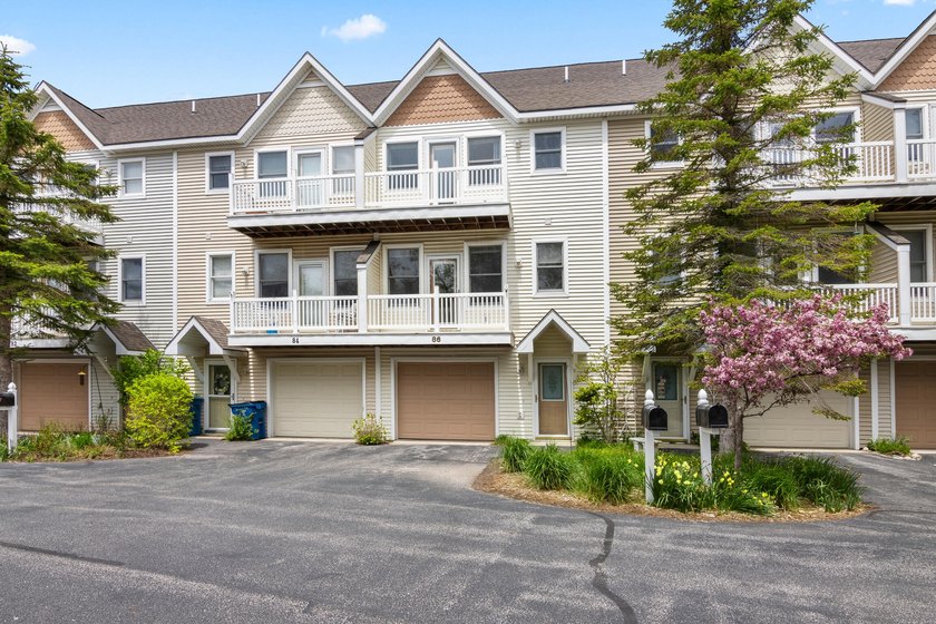 This condominium's location is fantastic! This 2-bedroom 2.5 - Beach Condo for sale in Manistee, Michigan on Beachhouse.com