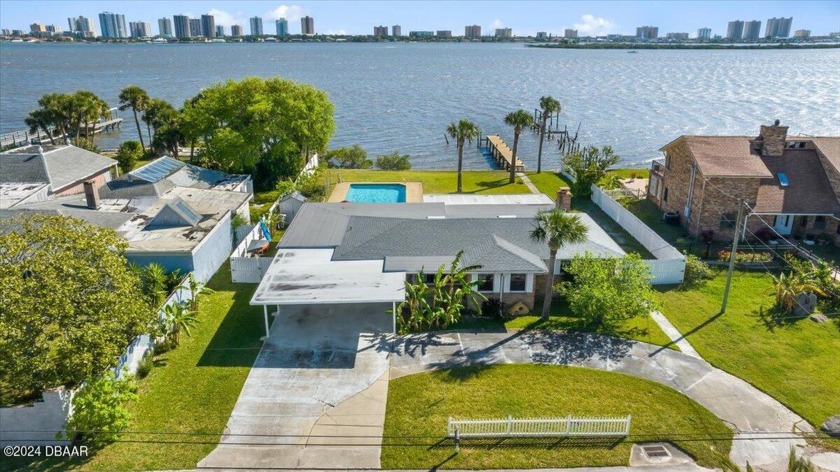 ENJOY DIRECT WATERFRONT LIVING IN THIS BEAUTIFULLY - Beach Home for sale in South Daytona, Florida on Beachhouse.com