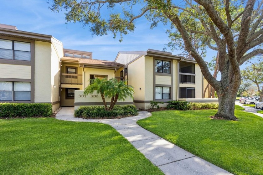 Check out this popular Woodlake Run Condo in gated East Lake - Beach Condo for sale in Oldsmar, Florida on Beachhouse.com