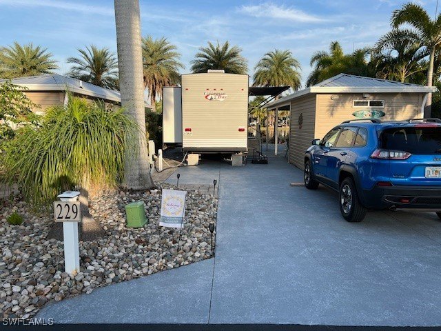 This east, facing Drive in motorhome lot sits on Sunset Lake and - Beach Lot for sale in Fort Myers, Florida on Beachhouse.com