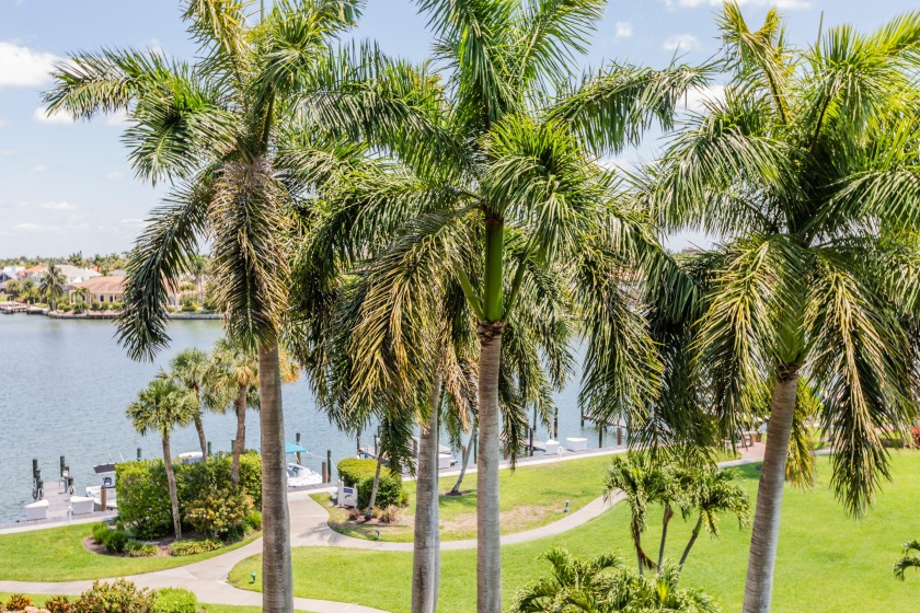 Enjoy views of Clam Bay and pool from the tropical lanai. New - Beach Home for sale in Marco Island, Florida on Beachhouse.com