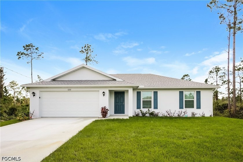Modern newer home featuring an open floor plan and light neutral - Beach Home for sale in Lehigh Acres, Florida on Beachhouse.com