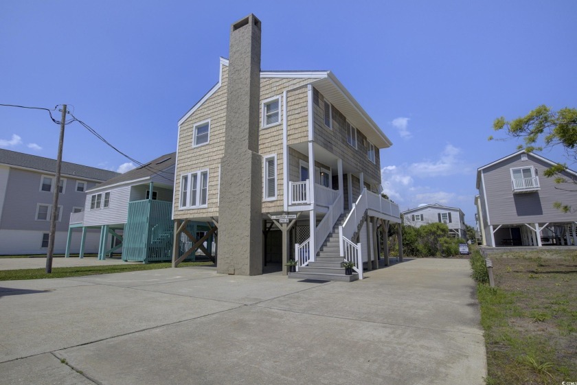 Welcome to your coastal sanctuary! This wonderful raised beach - Beach Home for sale in North Myrtle Beach, South Carolina on Beachhouse.com