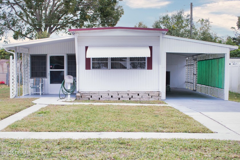 This solid, well-maintained mobile home offers an incredible - Beach Home for sale in Port Orange, Florida on Beachhouse.com