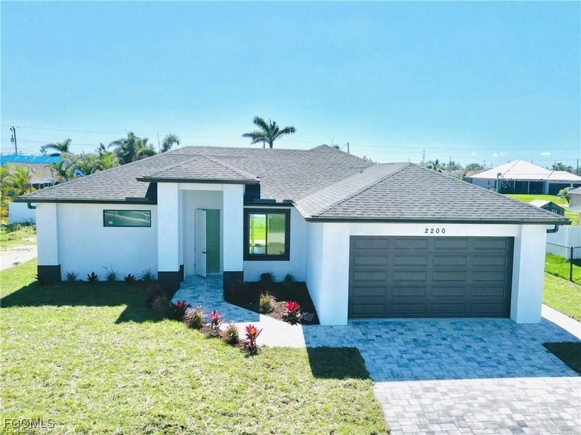 Stunning move-in ready home featuring impact-resistant windows - Beach Home for sale in Cape Coral, Florida on Beachhouse.com