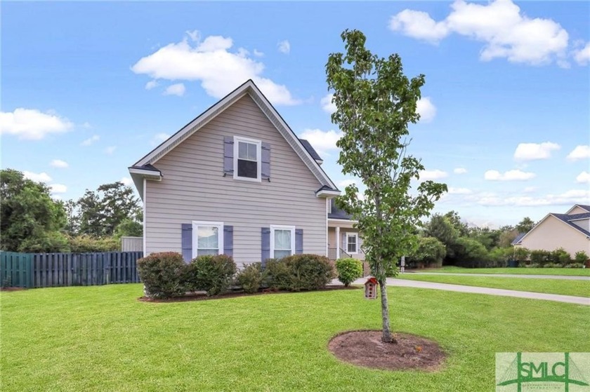 Step into this exquisitely spacious former model home! Revel in - Beach Home for sale in Richmond Hill, Georgia on Beachhouse.com