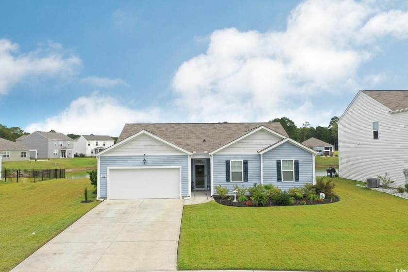 SHOWS AND LOOKS LIKE A MODEL HOME! This home overlooks a pond - Beach Home for sale in Longs, South Carolina on Beachhouse.com