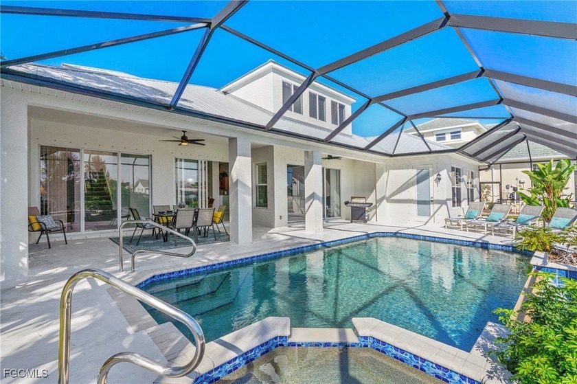 TURNKEY! This super spacious 4 bedroom+den/3.5 bathroom villa is - Beach Home for sale in Cape Coral, Florida on Beachhouse.com