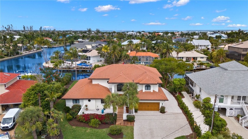 Located on a quiet cul-de-sac in the popular Shell Harbor - Beach Home for sale in Sanibel, Florida on Beachhouse.com
