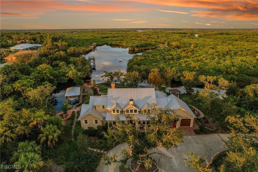 This private, gated, meticulously designed, old Florida style - Beach Home for sale in Punta Gorda, Florida on Beachhouse.com