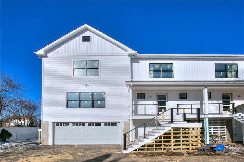 Welcome to your brand new three-story townhome completed by a - Beach Condo for sale in Fairfield, Connecticut on Beachhouse.com