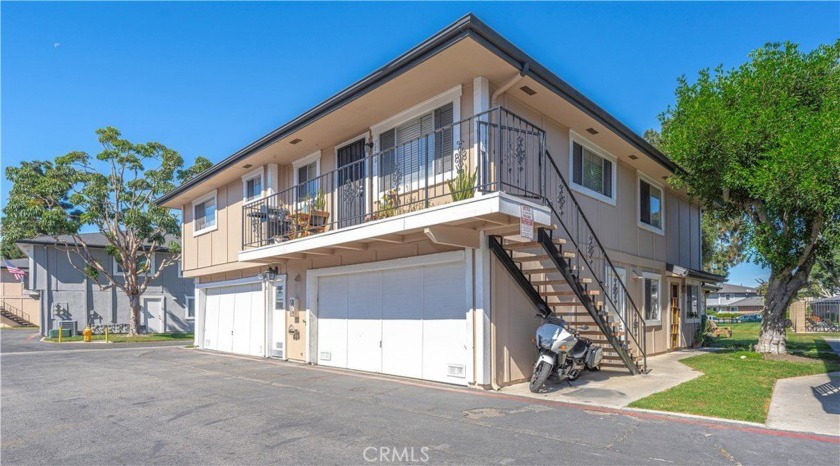 This charming home boasts 2 spacious bedrooms and 1 - Beach Condo for sale in Huntington Beach, California on Beachhouse.com