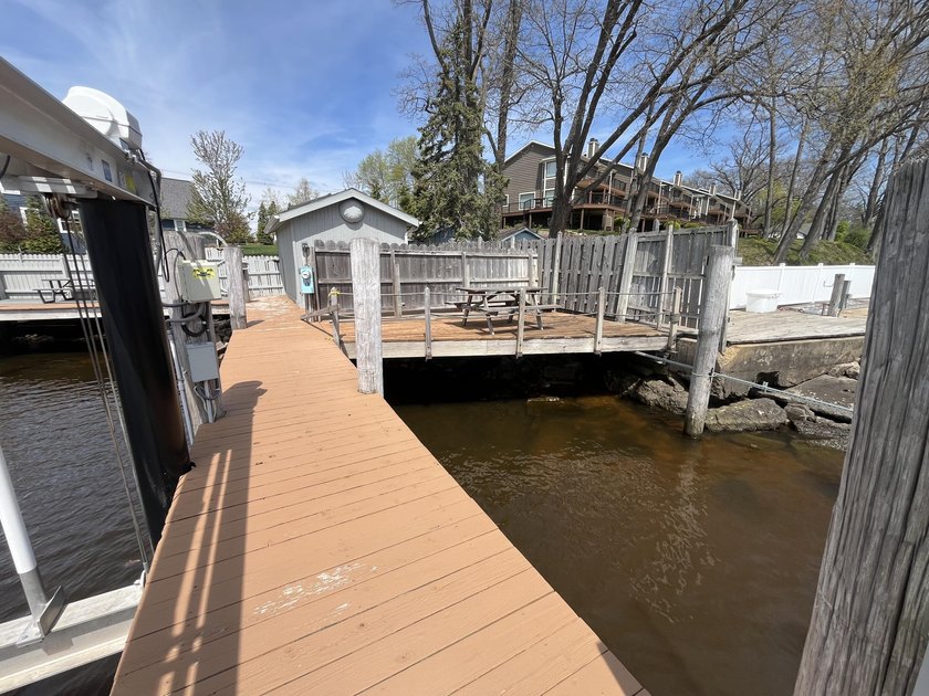16 x 48 Pier's End Cove boat slip WITH LIFT. Located on South - Beach Lot for sale in South Haven, Michigan on Beachhouse.com