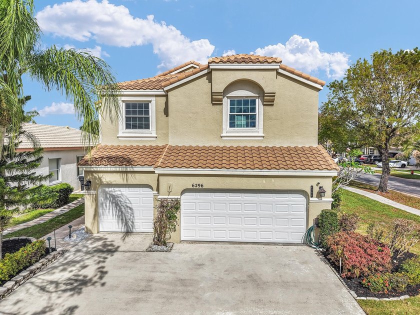 Exceptional single-family residence ideally situated on a corner - Beach Home for sale in Greenacres, Florida on Beachhouse.com