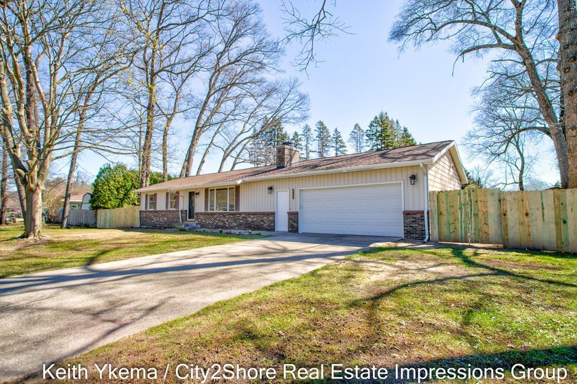 Welcome home to this beautifully renovated ranch at 1830 N - Beach Home for sale in Muskegon, Michigan on Beachhouse.com