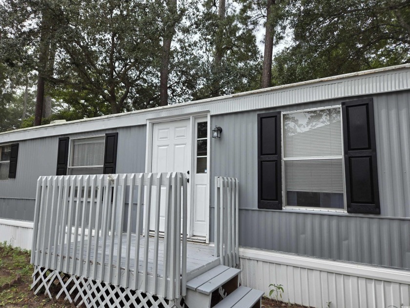 Home features all new appliances, new flooring, ceiling fans - Beach Home for sale in Garden City Beach, South Carolina on Beachhouse.com