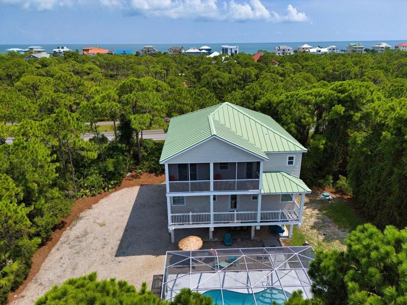 Welcome to Island Blessings, a charming 4-bedroom, 4.5-bathroom - Beach Home for sale in St. George Island, Florida on Beachhouse.com